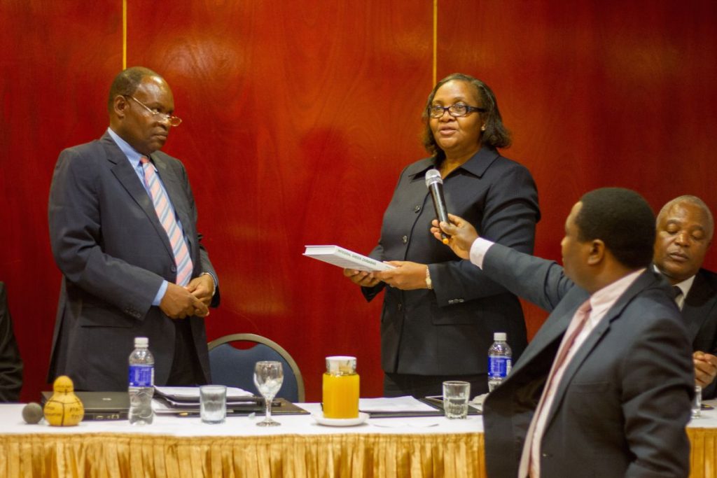 Pundutso Trans4m Workshop June 2016 Liz Mamukwa Handover Book to Minister Representative